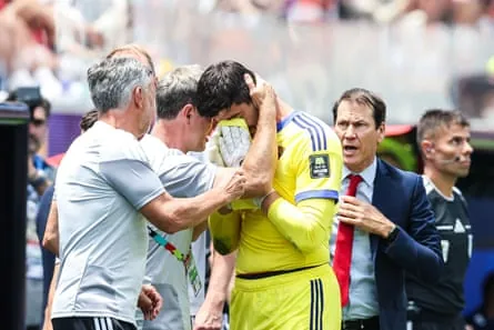 An emotional Thibaut Courtois goes off with an injury
