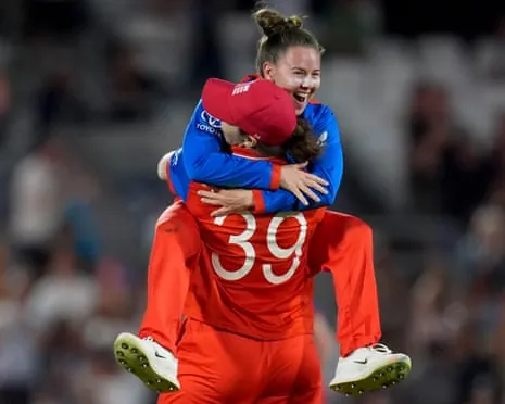 England's Linsey Smith (top) celebrates with Nat Sciver-Brunt after winning the Women's T20 World Cup semi-final match against South Africa.