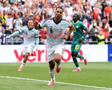 Youri Tielemans celebrates.